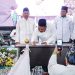 Pemkab dan PCNU Gresik Teken MoU, Sepakat Penuhi Hak Anak-Anak PMI di Malaysia pada Puncak Hari Santri