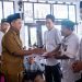 Bupati Gresik Salurkan Bingkisan Lebaran Kepada Penjaga Keamanan dan Petugas Kebersihan Seluruh UPT SMP Negeri